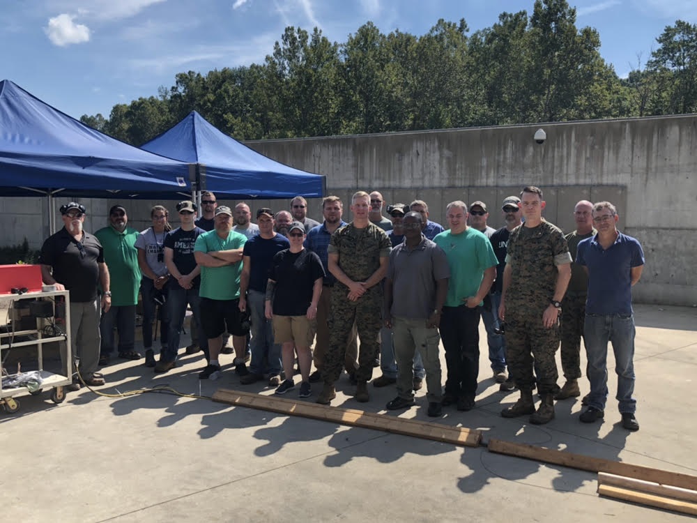 Figure 2: Group Photo with Col Stower (PfM GCES) at the SWAF during the M2A1 Test